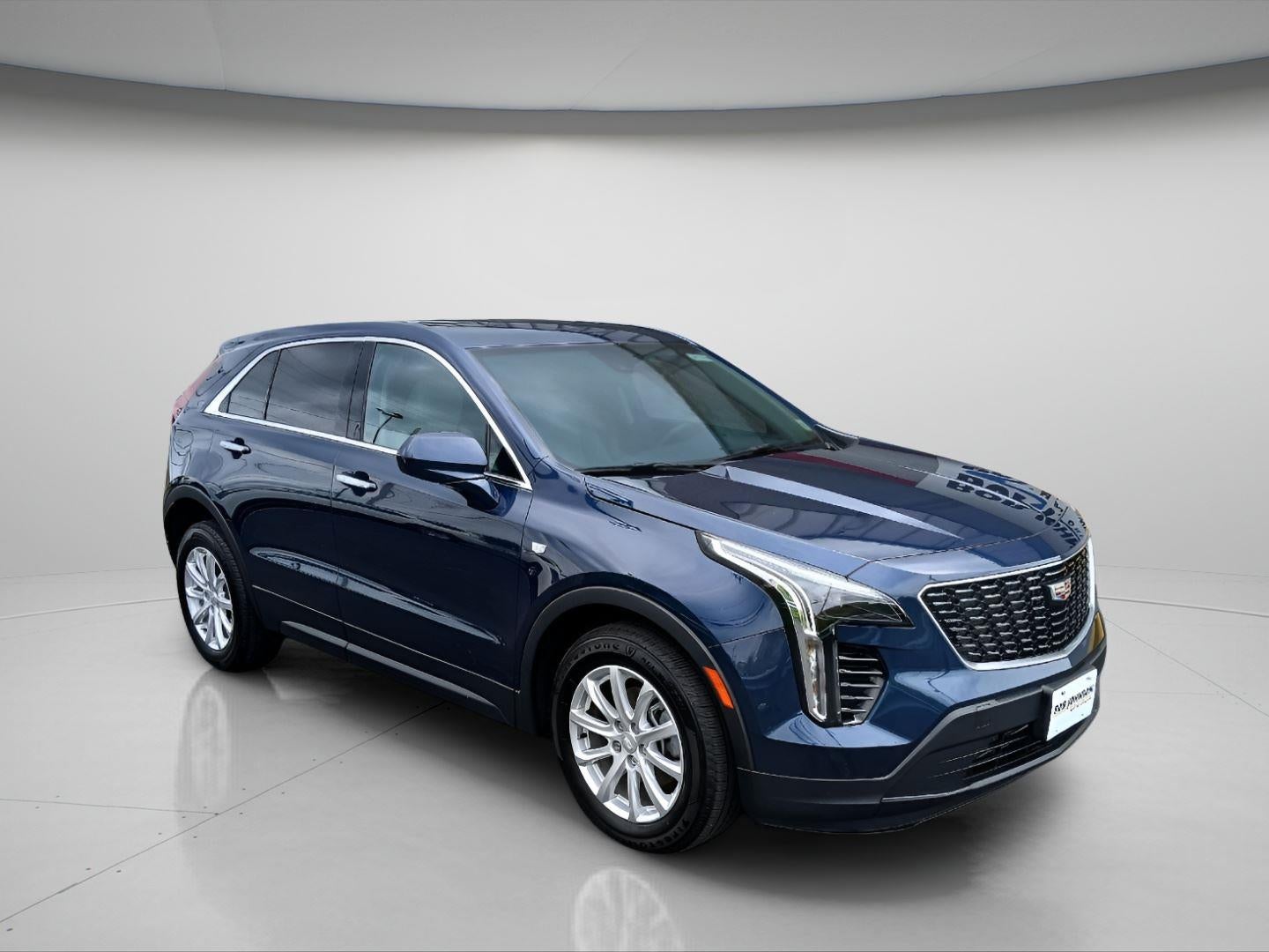 2022 Cadillac XT4 AWD Luxury in Twilight Blue Metallic — front three-quarter view