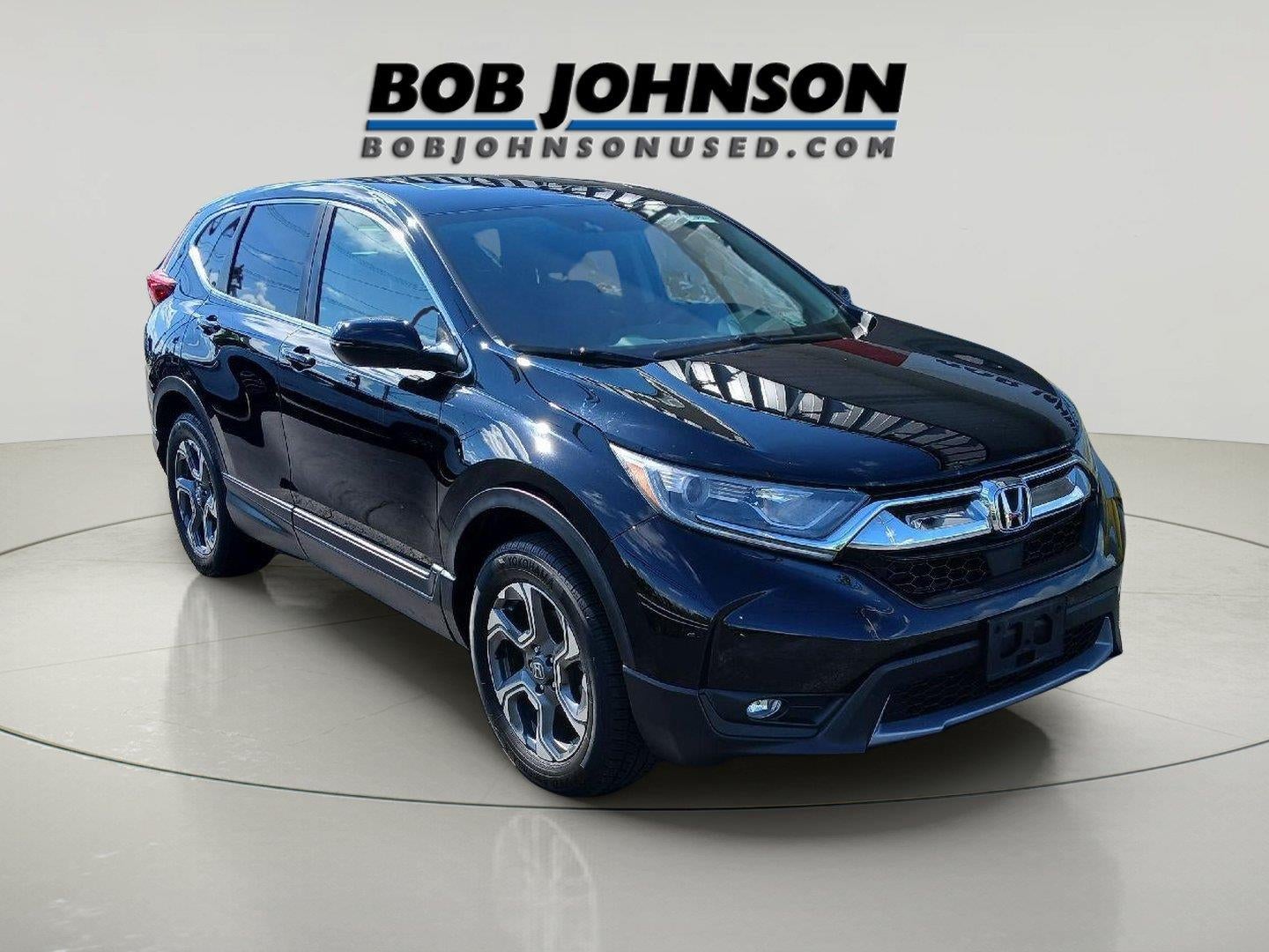2018 Honda CR-V SUBN in Crystal Black Pearl — front three-quarter view