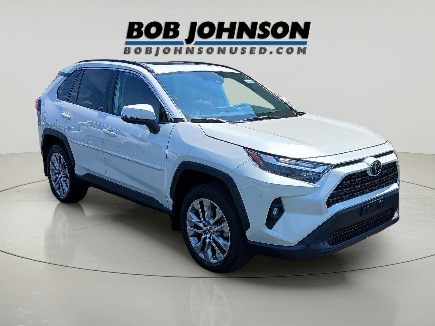 2022 Toyota RAV4 XLE Premium in Blizzard Pearl — front three-quarter view