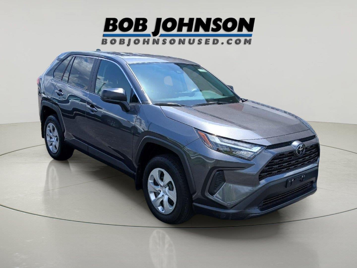 2023 Toyota RAV4 LE in Magnetic Gray Met. — front three-quarter view