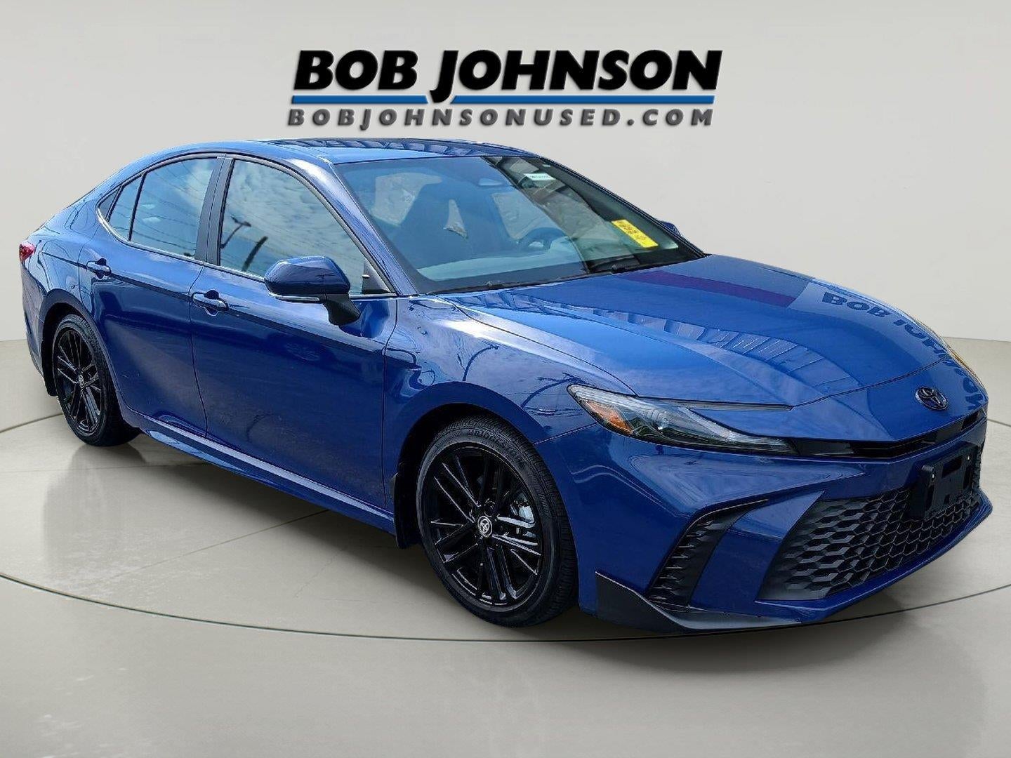 2026 Toyota Camry SE in Reservoir Blue — front three-quarter view