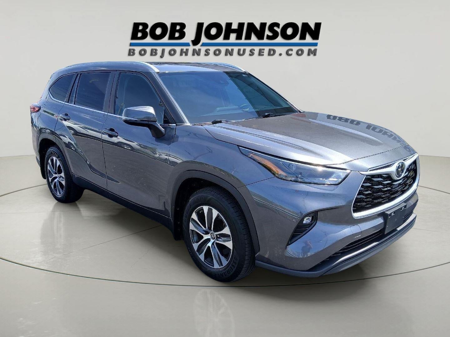 2023 Toyota Highlander XLE in Magnetic Gray Met. — front three-quarter view