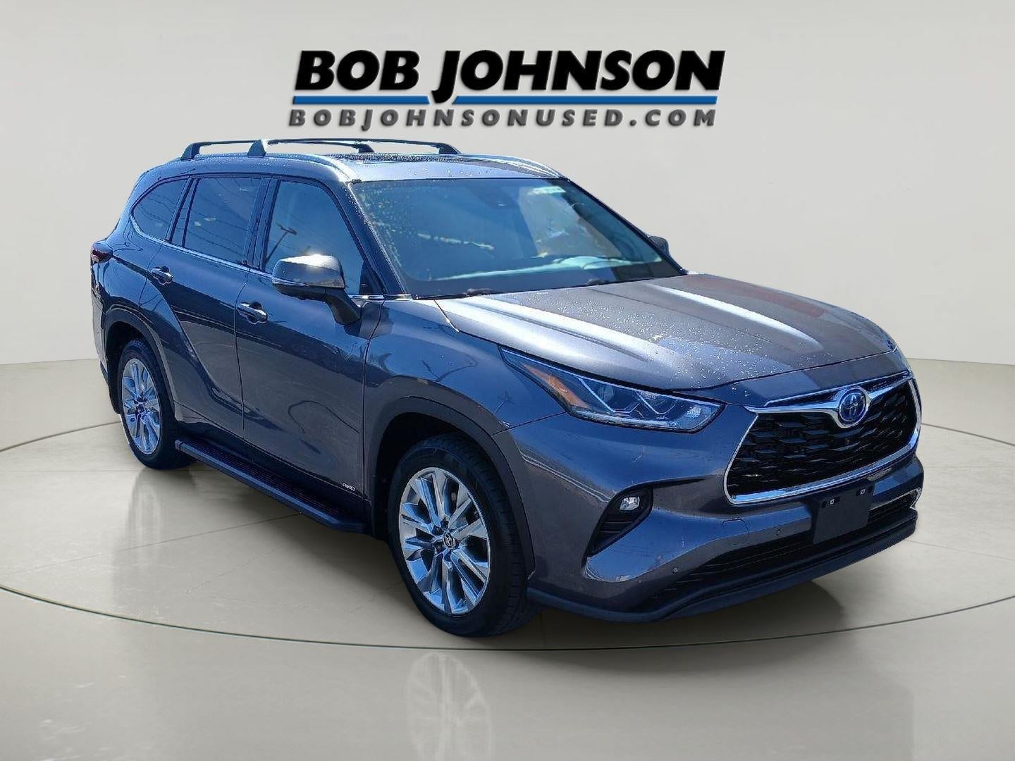 2024 Toyota HIGHLANDER HEV Limited in Magnetic Gray Met. — front three-quarter view