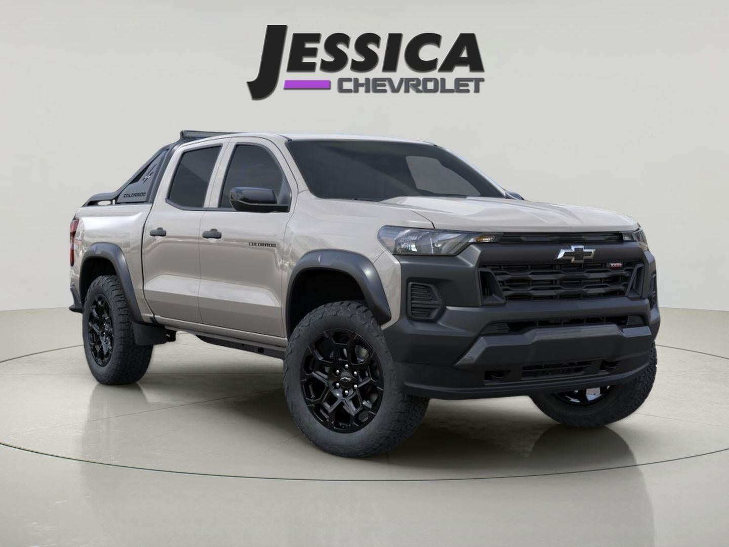 2026 Chevrolet Colorado Trail Boss in White Sands — front three-quarter view