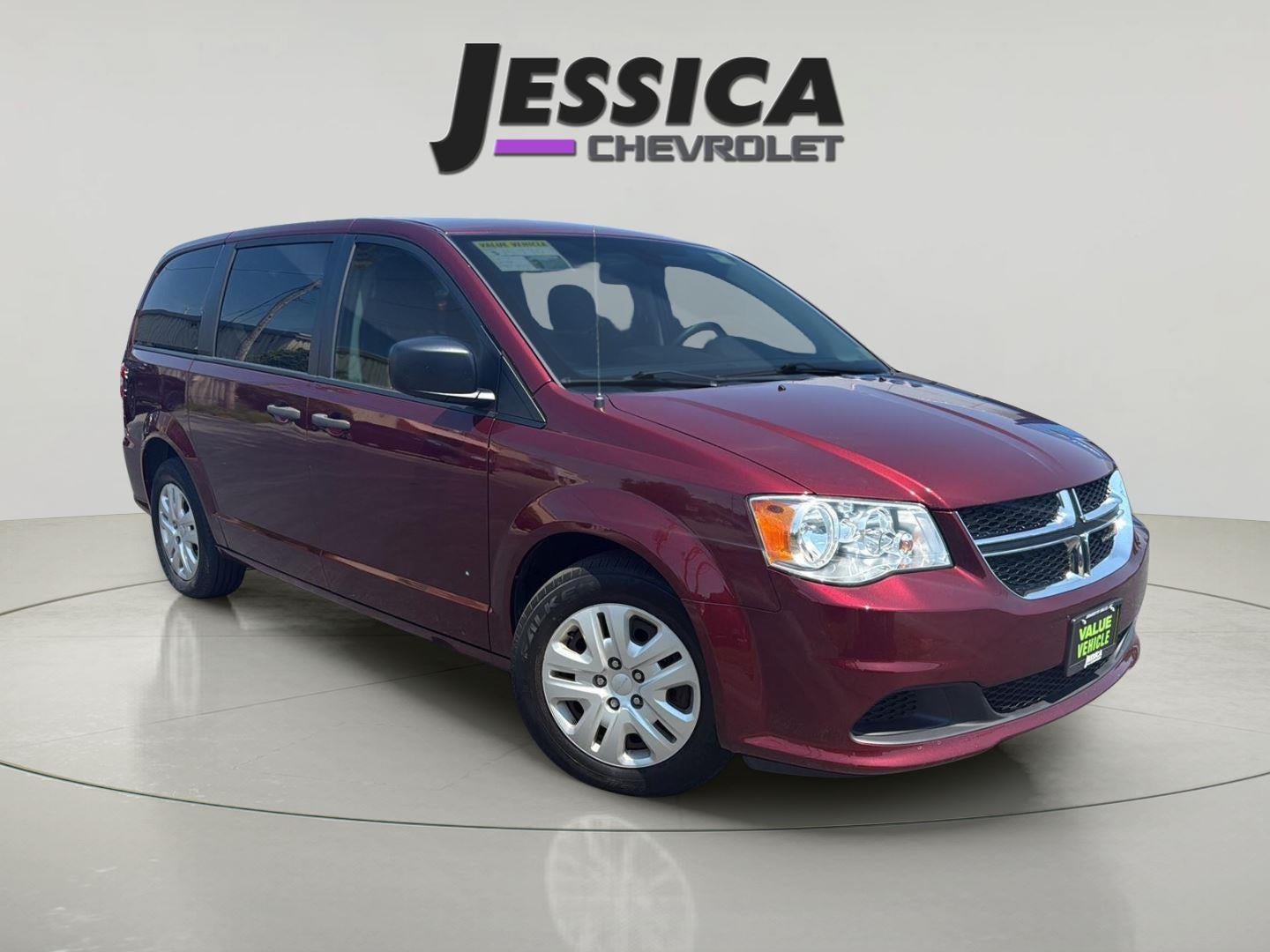2019 Dodge Grand Caravan SE in Red — front three-quarter view