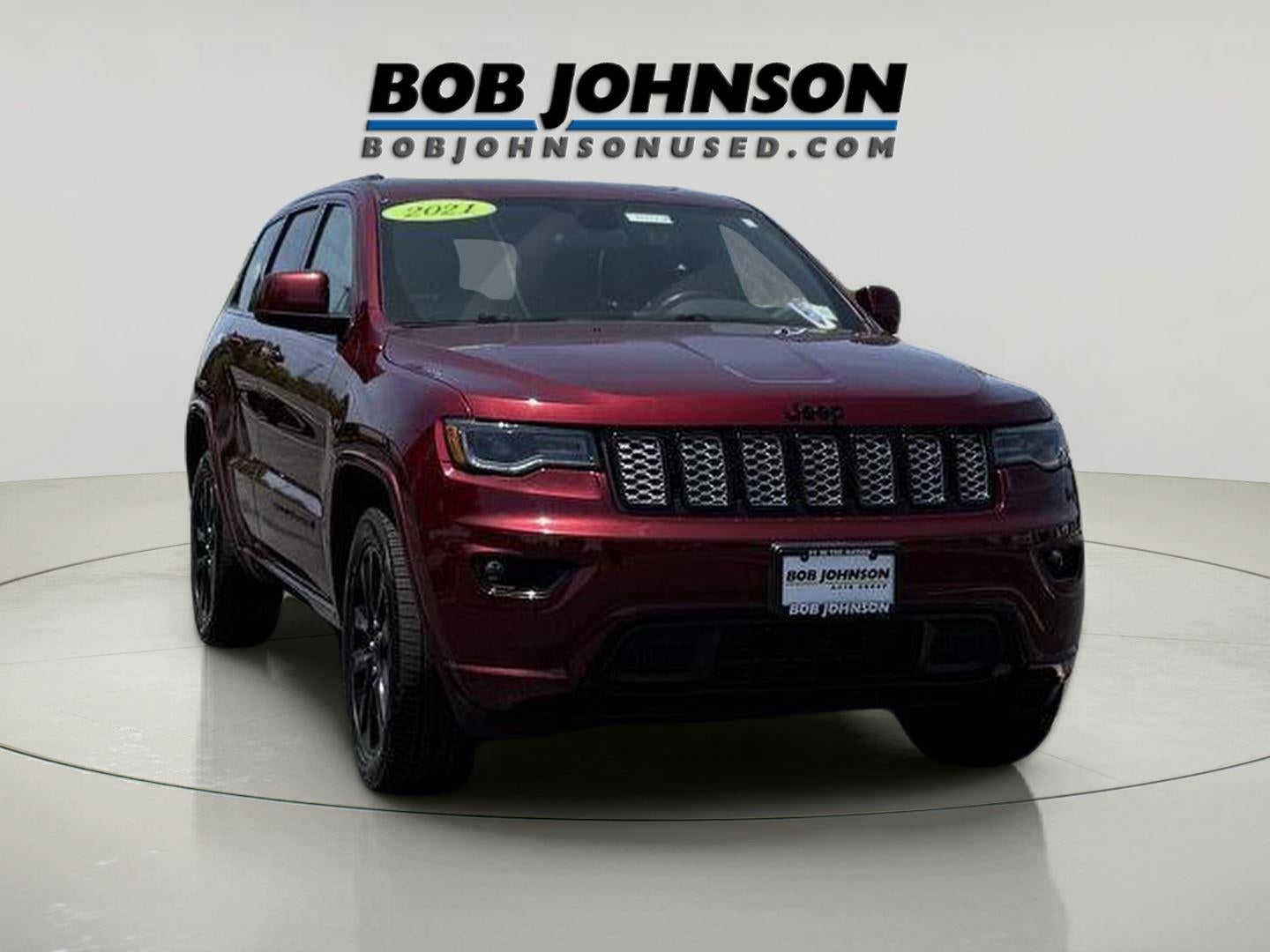 2021 Jeep Grand Cherokee Laredo X in Velvet Red Pearlcoat — front three-quarter view