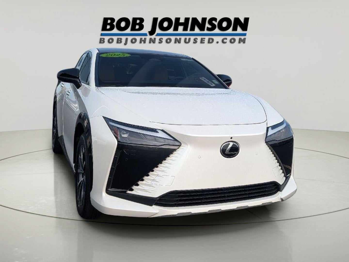 2025 Lexus RZ 450e PREMIUM AWD in Eminent White Pearl — front three-quarter view