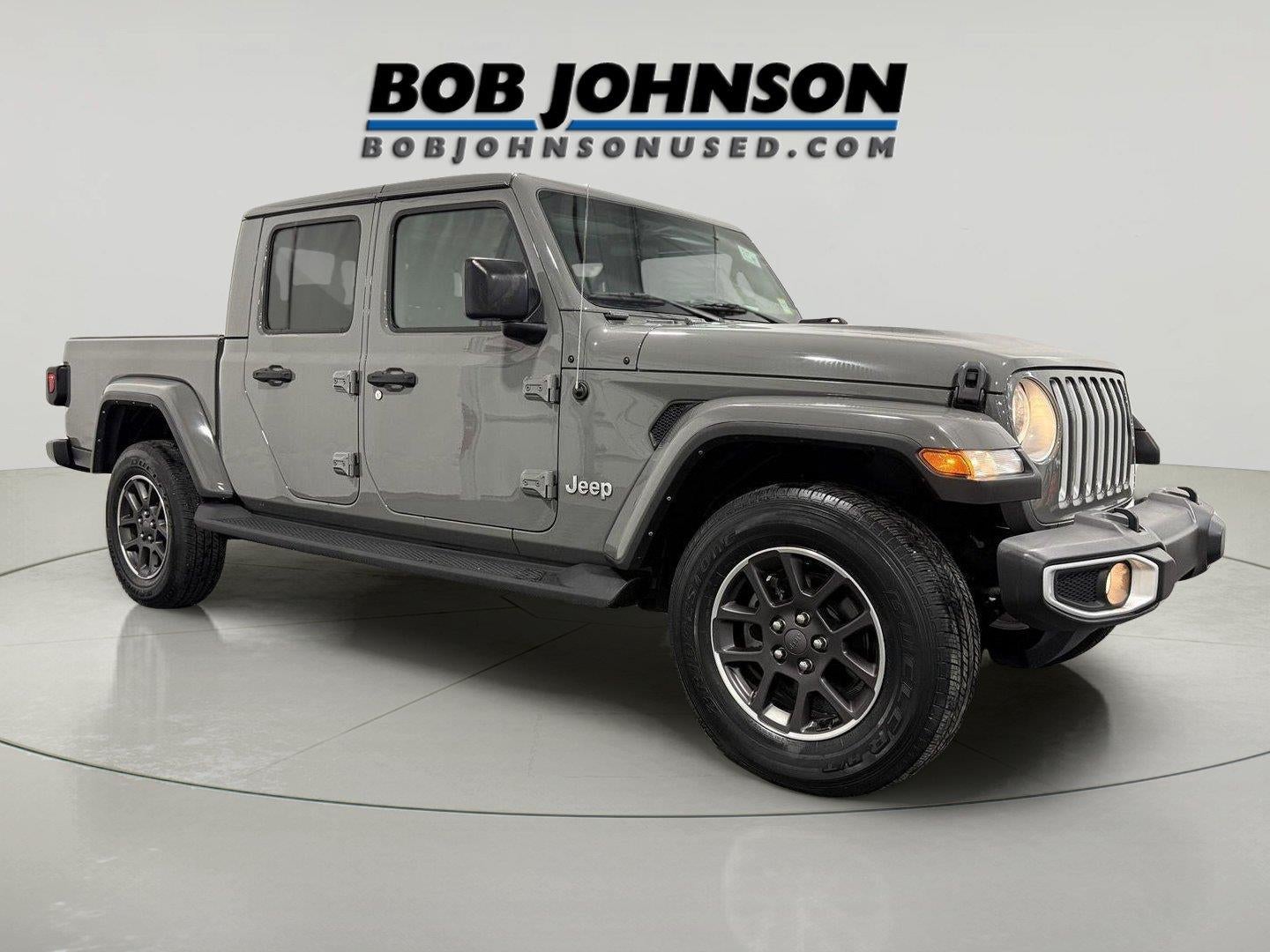 2021 Jeep Gladiator Overland 4x4 in Sting-Gray Clearcoat — front three-quarter view