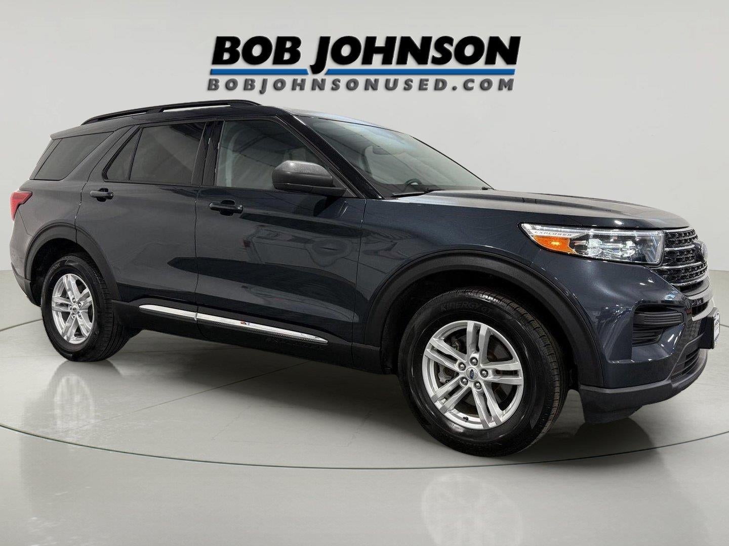 2023 Ford Explorer XLT in Stone Blue — front three-quarter view