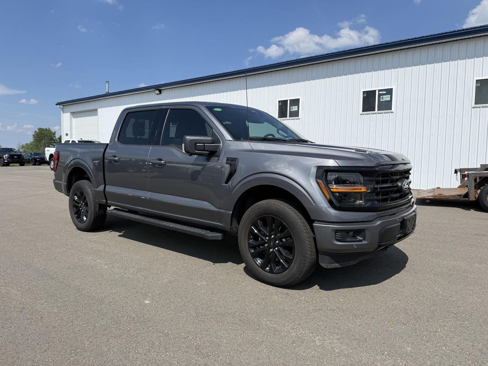 2024 Ford F-150 XLT in Carbonized Gray — front three-quarter view