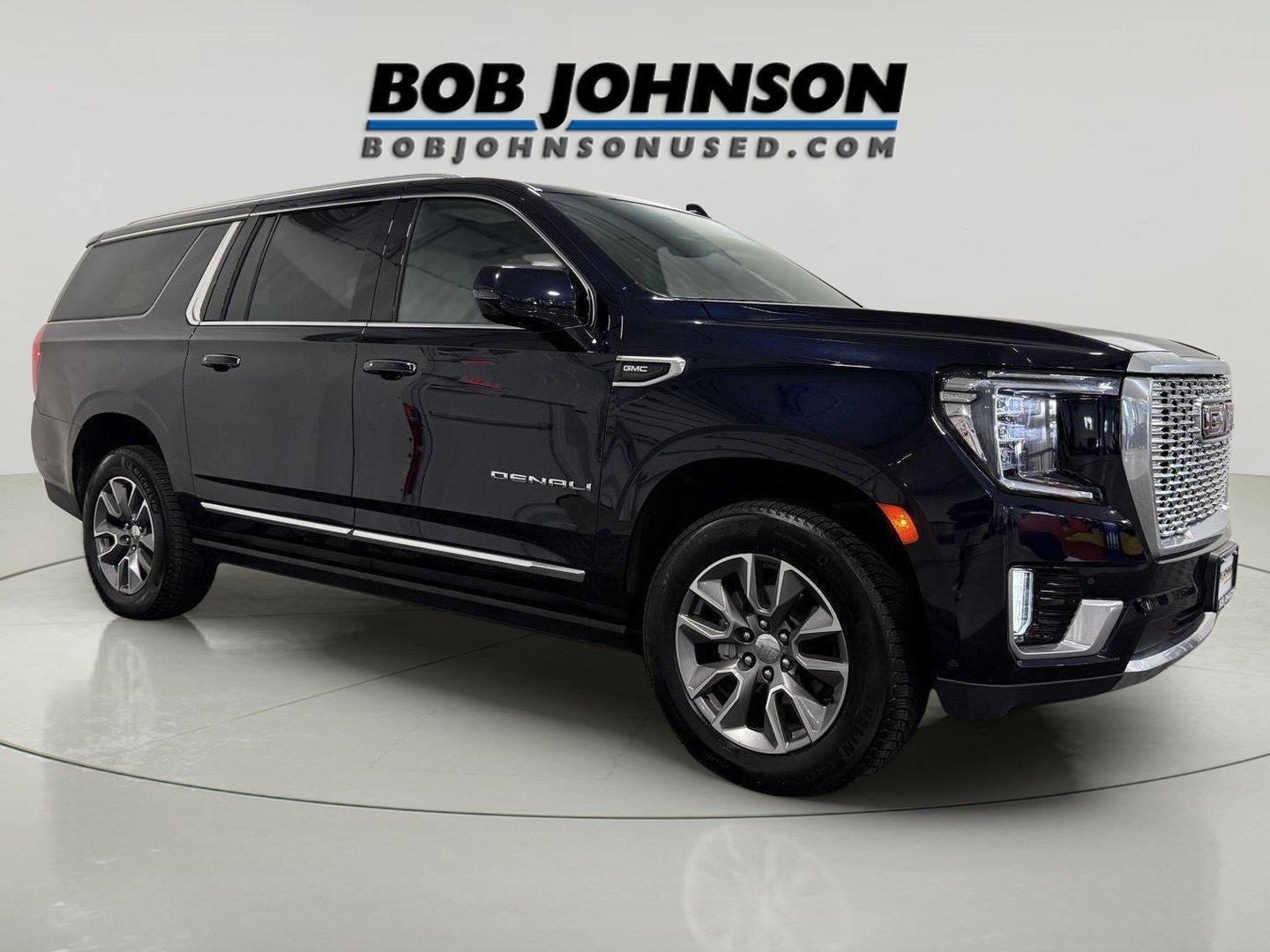 2023 GMC Yukon XL Denali in Midnight Blue Metallic — front three-quarter view