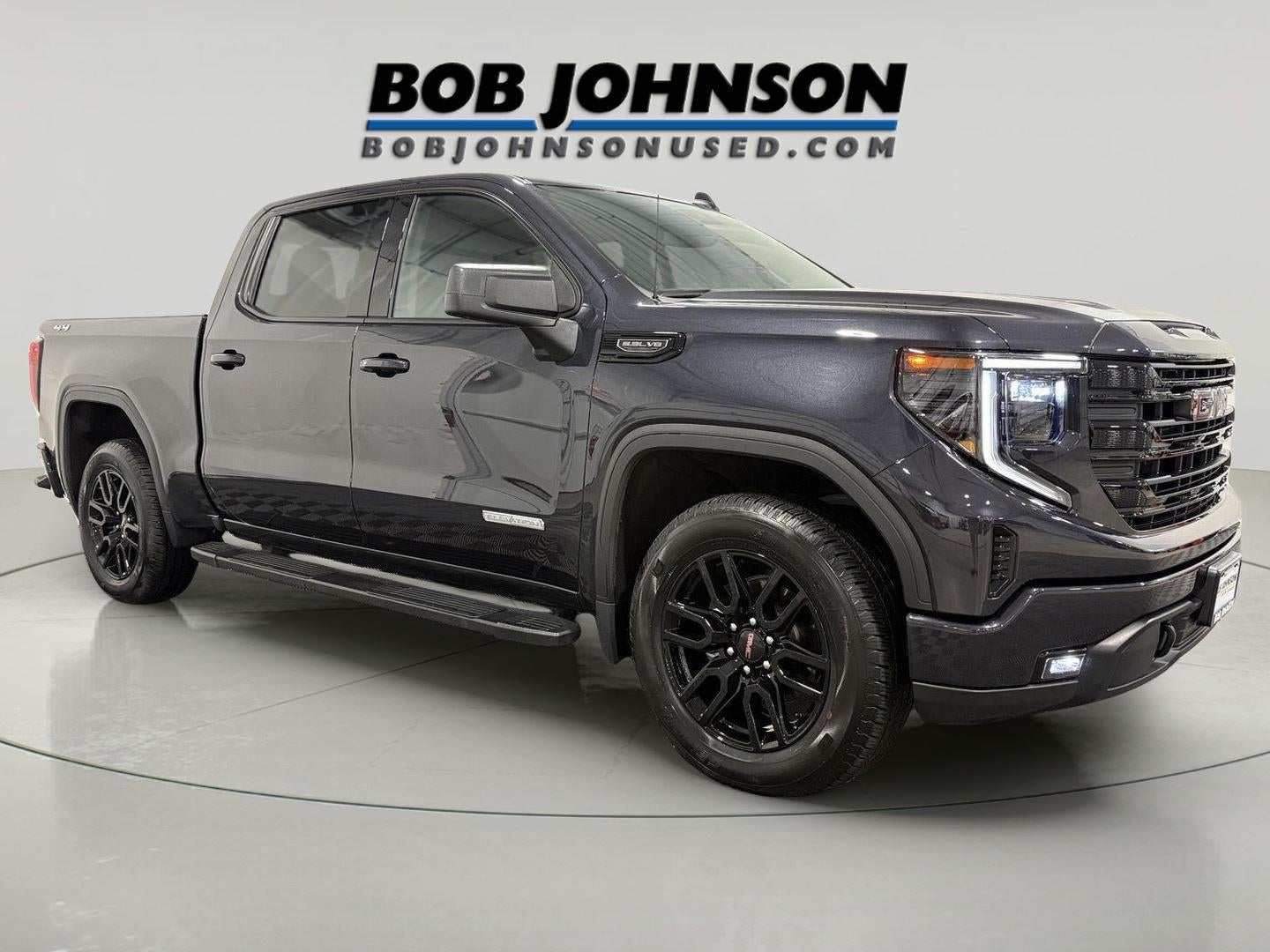 2024 GMC Sierra 1500 Elevation in Titanium Rush Metallic — front three-quarter view
