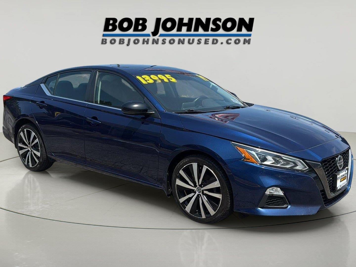 2019 Nissan Altima 2.5 SR in Deep Blue Pearl — front three-quarter view