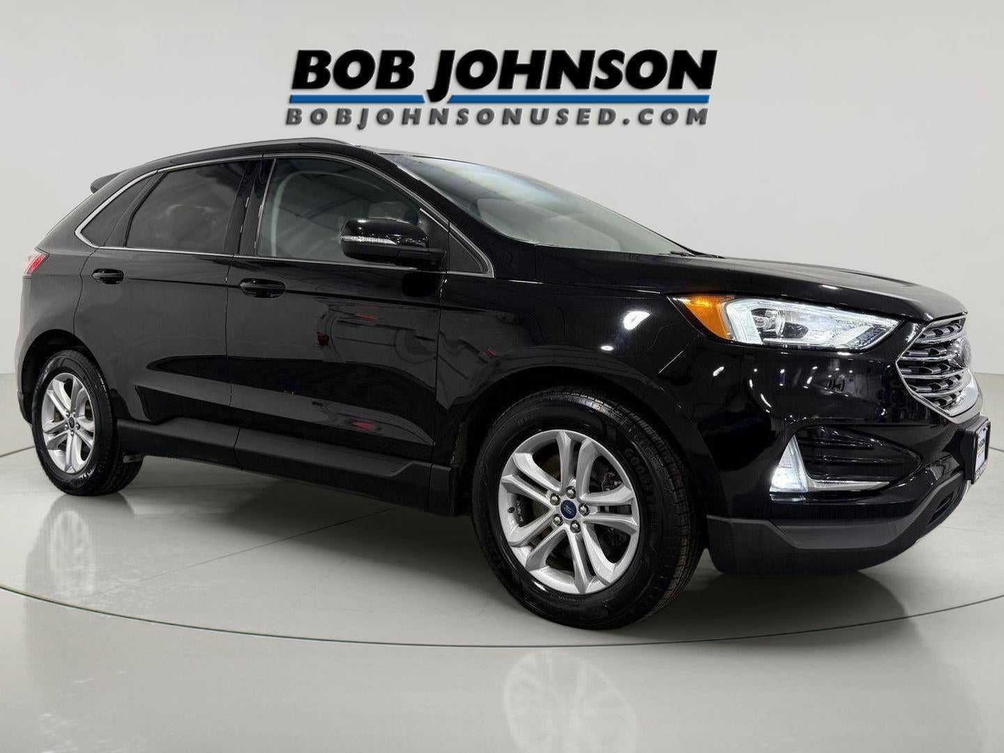 2020 Ford Edge SEL in Agate Black — front three-quarter view