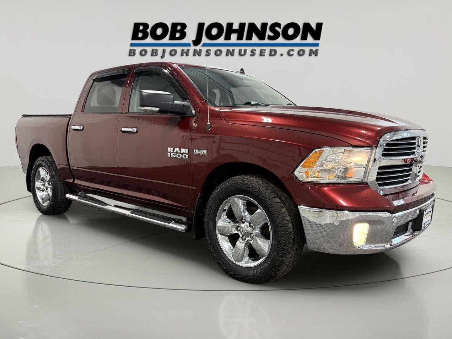 2018 RAM 1500 Big Horn Crew Cab 4x4 5'7' Box in Delmonico Red Pearlcoat — front three-quarter view