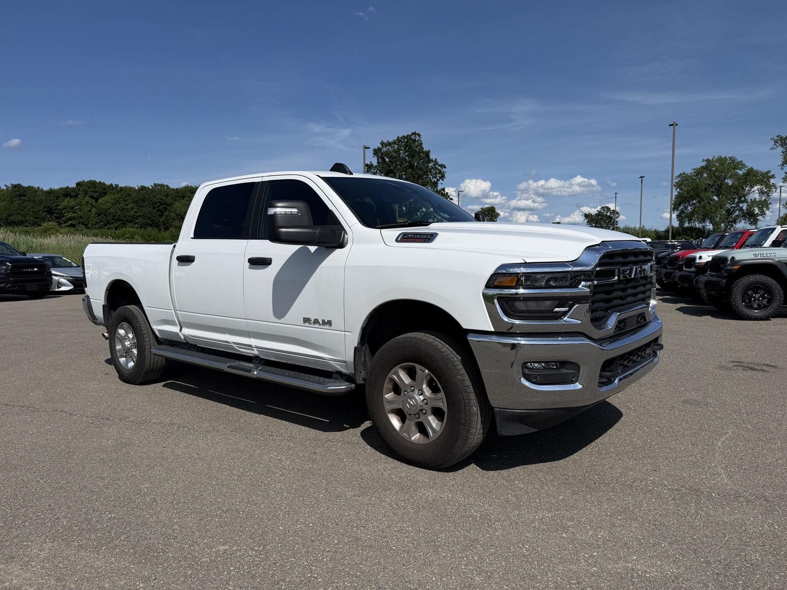 2026 RAM 2500 Big Horn in Bright White Clearcoat — front three-quarter view