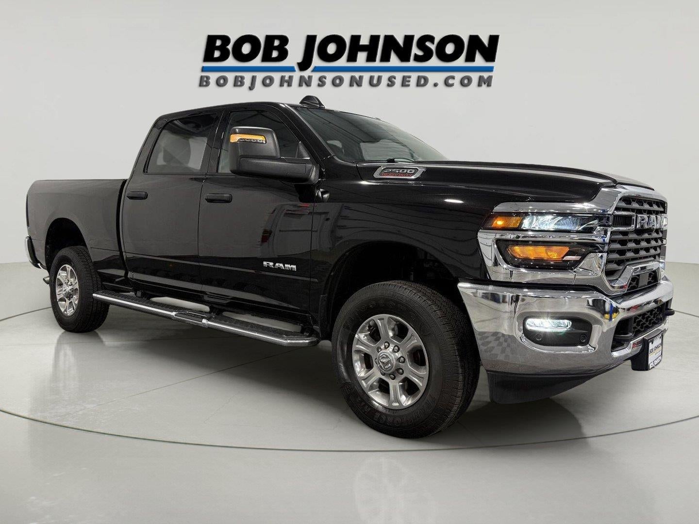 2026 RAM 2500 Big Horn in Diamond Black Crystal Pearlcoat — front three-quarter view
