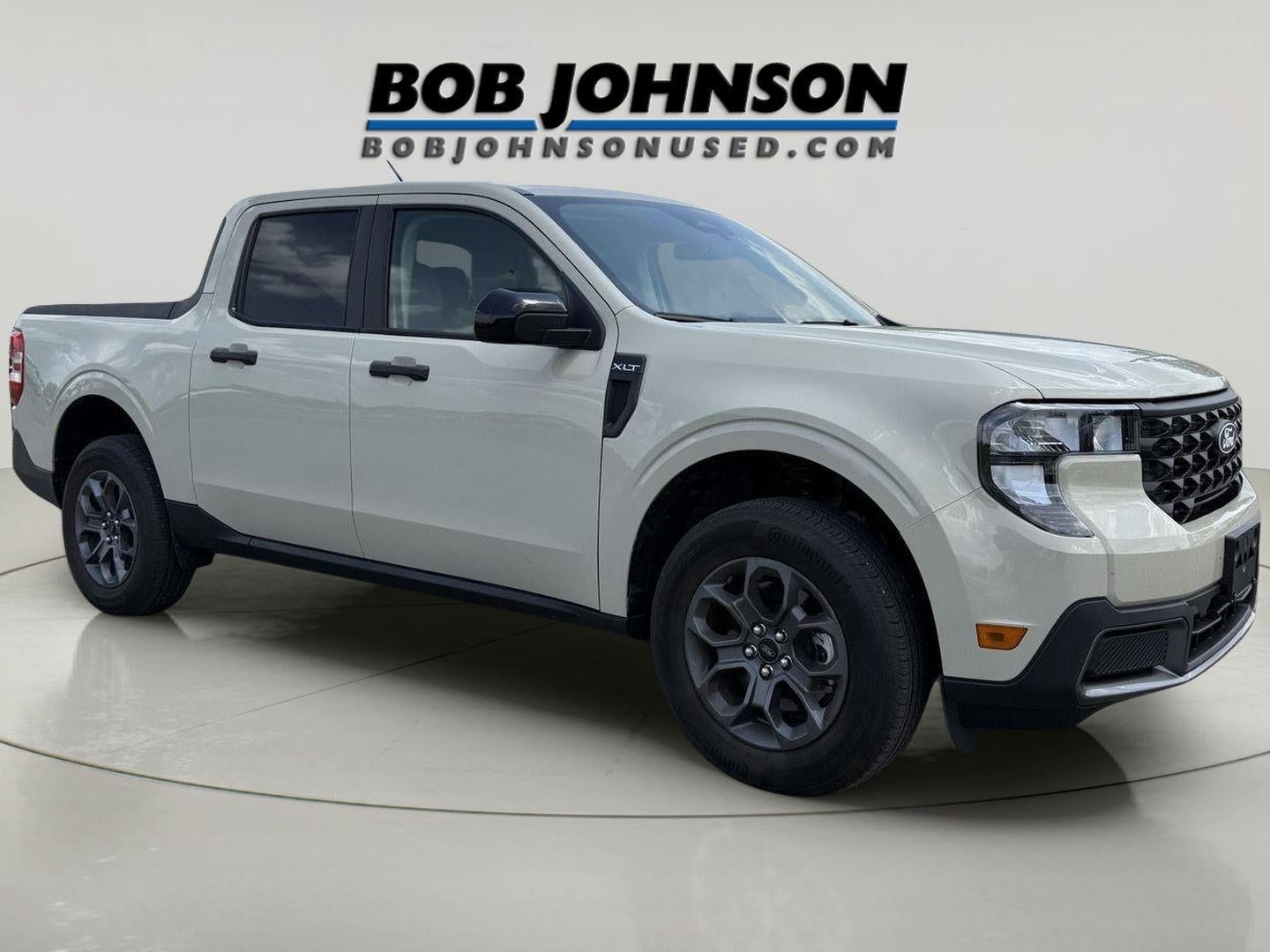 2025 Ford Maverick XLT in Desert Sand — front three-quarter view