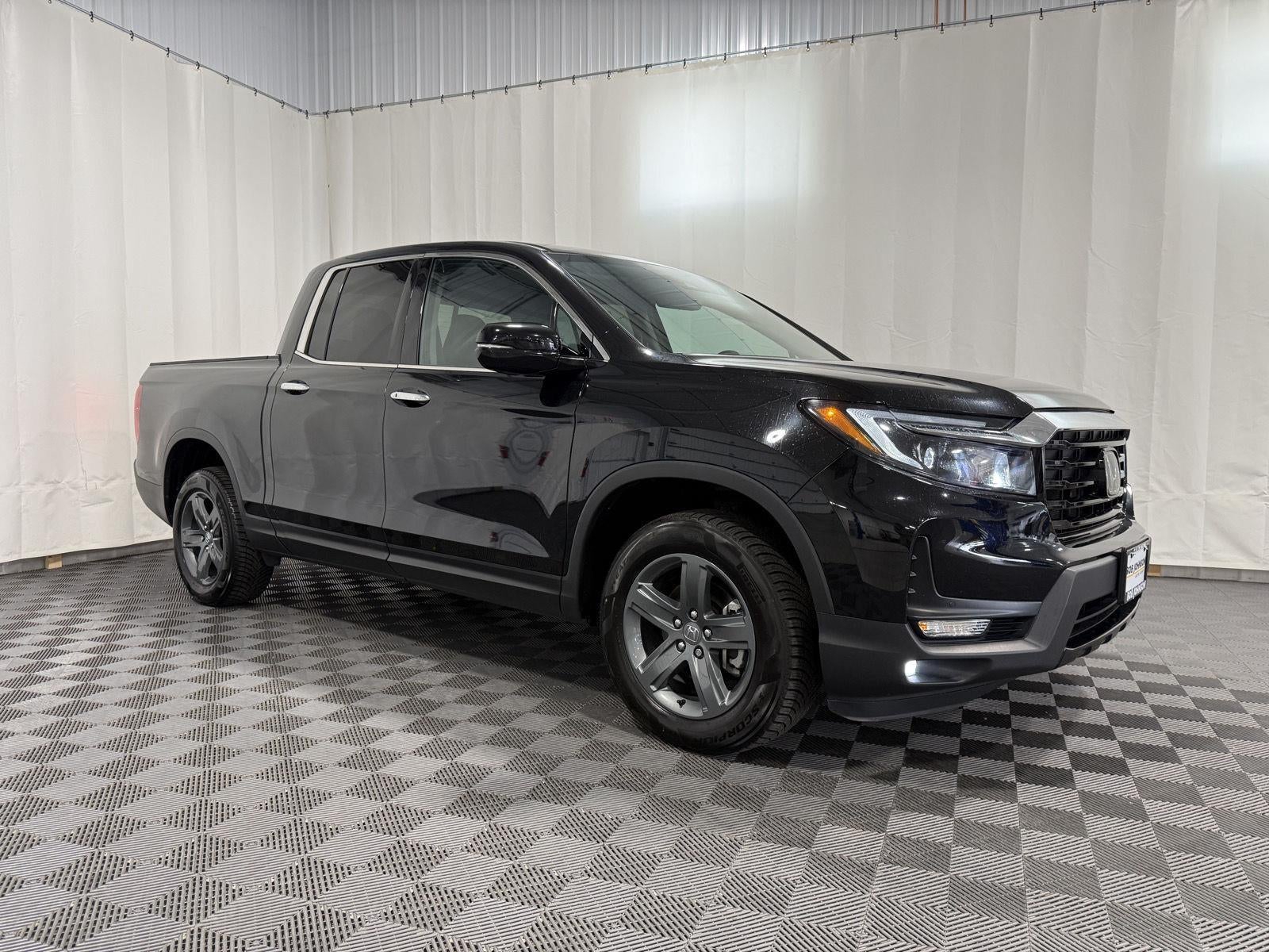 2023 Honda Ridgeline RTL-E in Crystal Black Pearl — front three-quarter view
