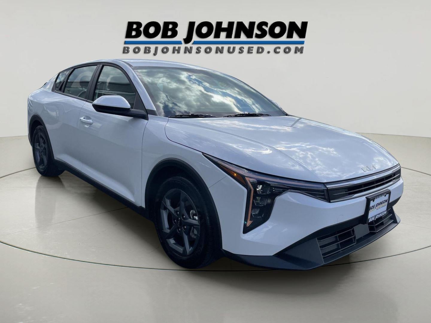 2025 Kia K4 LXS in Snow White Pearl — front three-quarter view