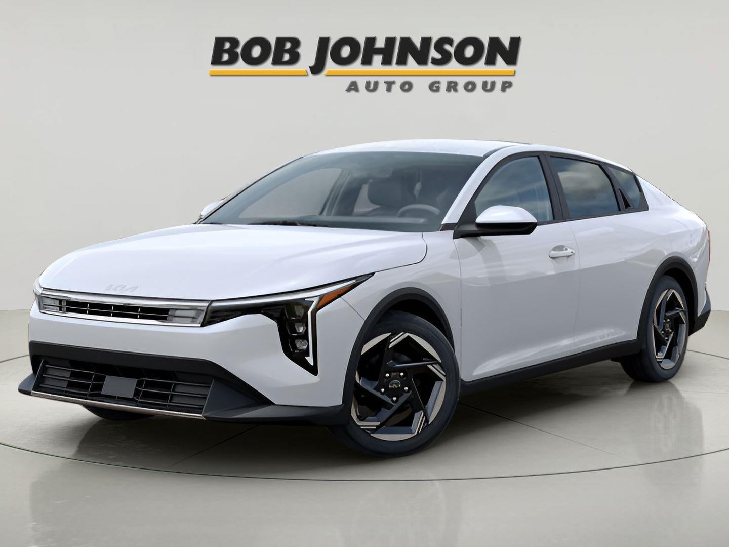 2025 Kia K4 EX in Snow White Pearl — front three-quarter view