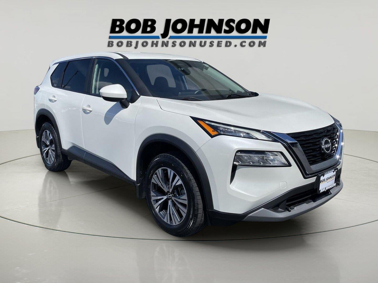 2023 Nissan Rogue SV in Pearl White Tricoat — front three-quarter view