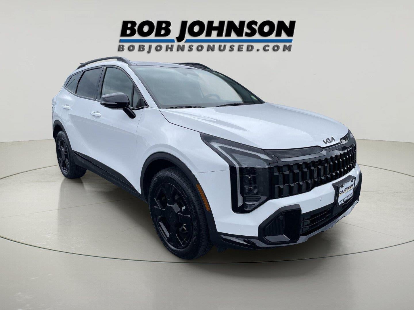 2026 Kia Sportage X-Line in Glacial White Pearl — front three-quarter view