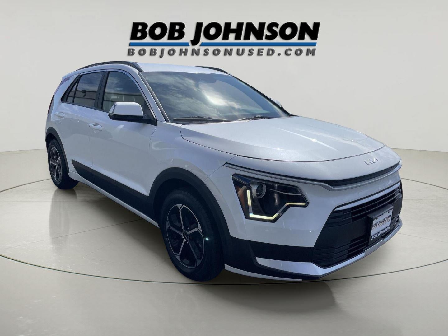 2023 Kia Niro EX in Snow White Pearl — front three-quarter view
