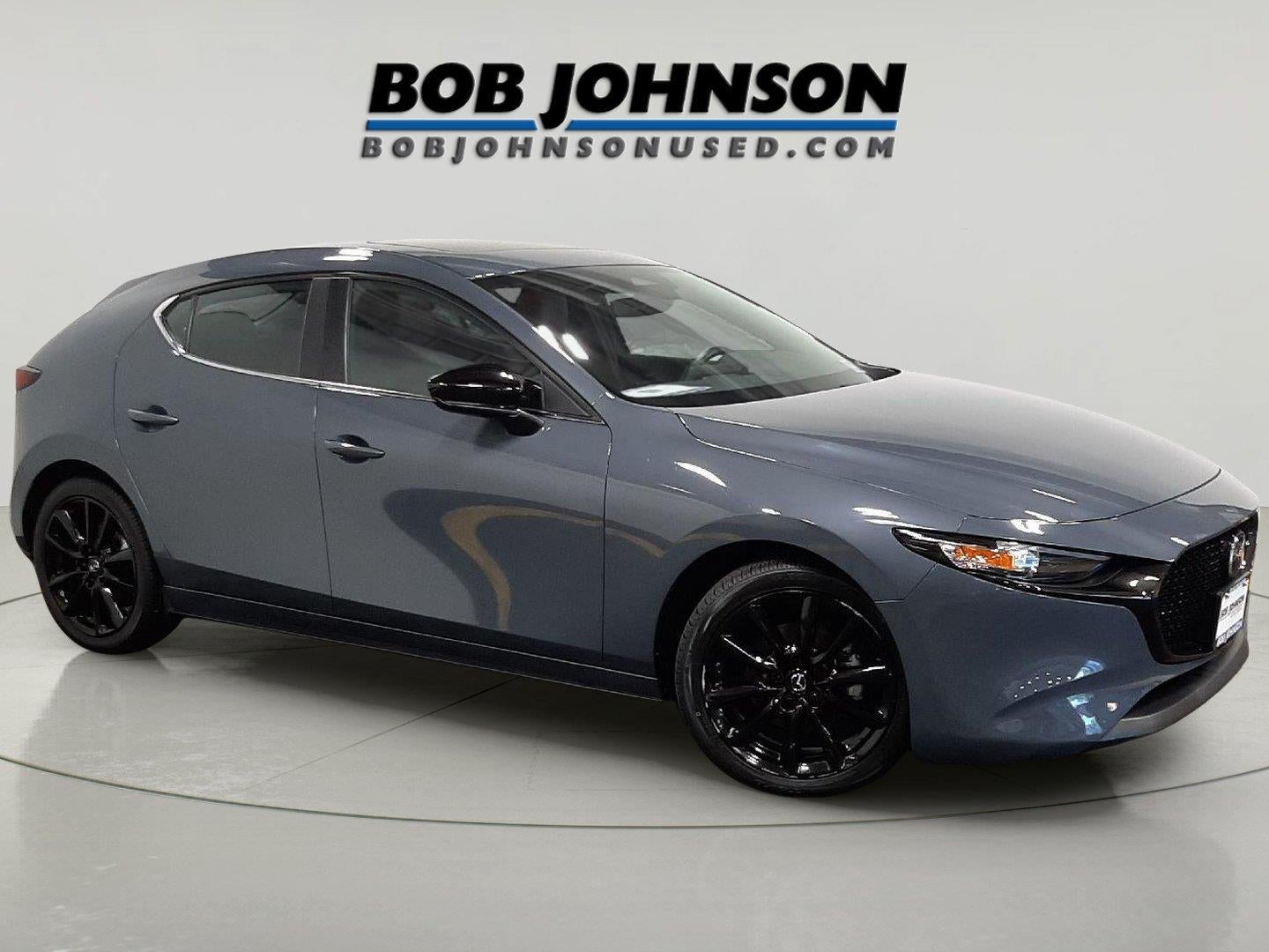 2024 Mazda Mazda3 Hatchback 2.5 S Carbon Edition in Polymetal Gray Metallic — front three-quarter view