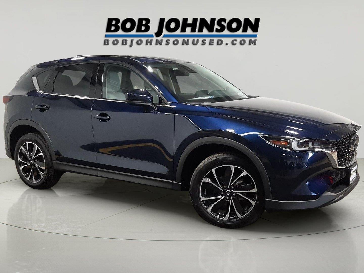 2023 Mazda Mazda CX-5 2.5 S Premium Plus Package in Deep Crystal Blue Mica — front three-quarter view