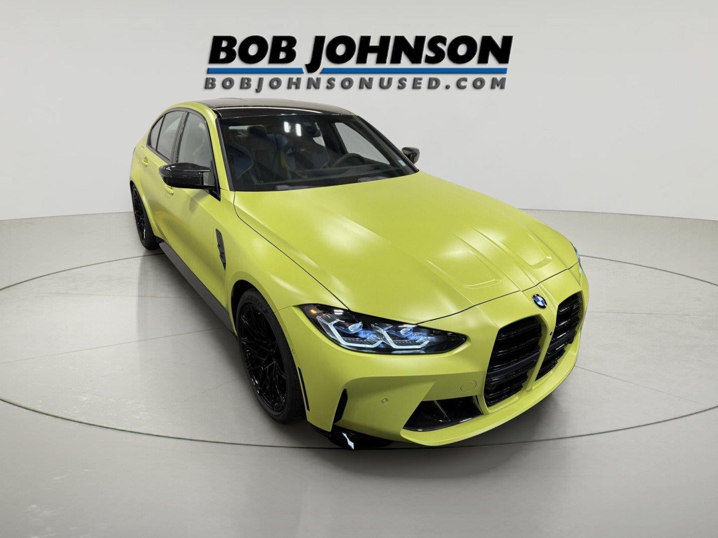 2024 BMW M3 Competition xDrive in Sao Paulo Yellow — front three-quarter view